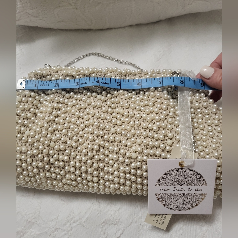 Elegant Cream Beaded Clutch with Curved Frame - Picture 9 of 15